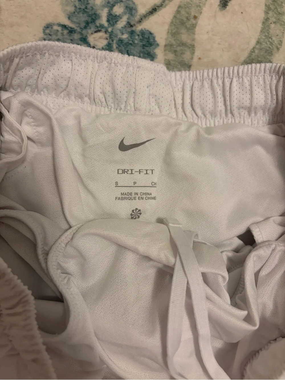 Nike White Athletic Running Shorts with Reflective Swoosh